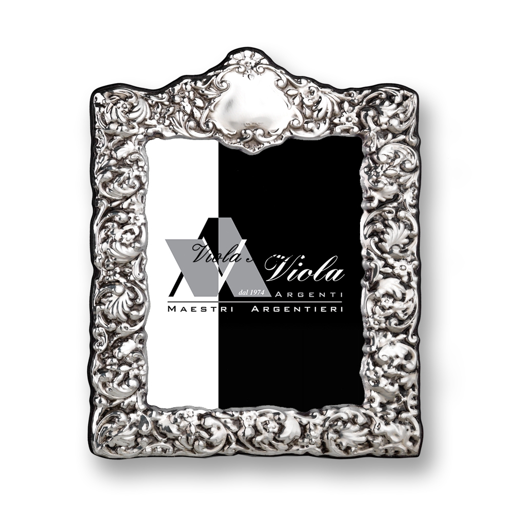 Cornice portafoto rettangolare in argento 925°°° lavorazione floreale in rilievo di Viola Argenti. Argento online