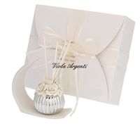 Ribbed rose perfumer with stylized arch base