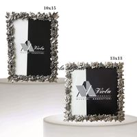 Cornice argento con uva