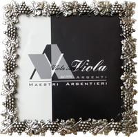 Cornice argento con uva