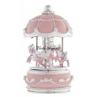 Pink carousel horses with light