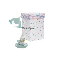 Led lamp and teddy bear touch green water