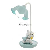 Led lamp and teddy bear touch green water