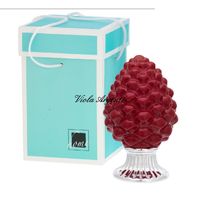 Red pine cone sculpture