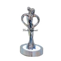 Embraced pair lamp
