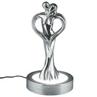 Heart-shaped couple lamp in embrace