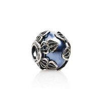 Charm in dark blue filigree embroidery