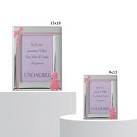 Cornice bimba con fiocco
