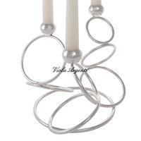 Three-flame candlestick with circles
