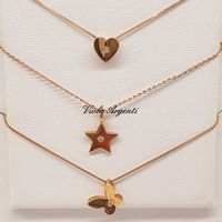 Collane con ciondolo oro 18 kt e diamanti