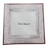 Decorated silver mirror