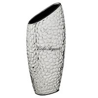 Stone vase with rock relief design