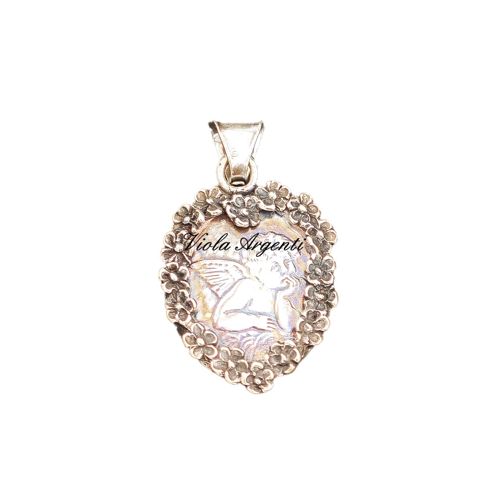 Angel heart pendant with daisies di . Argento online