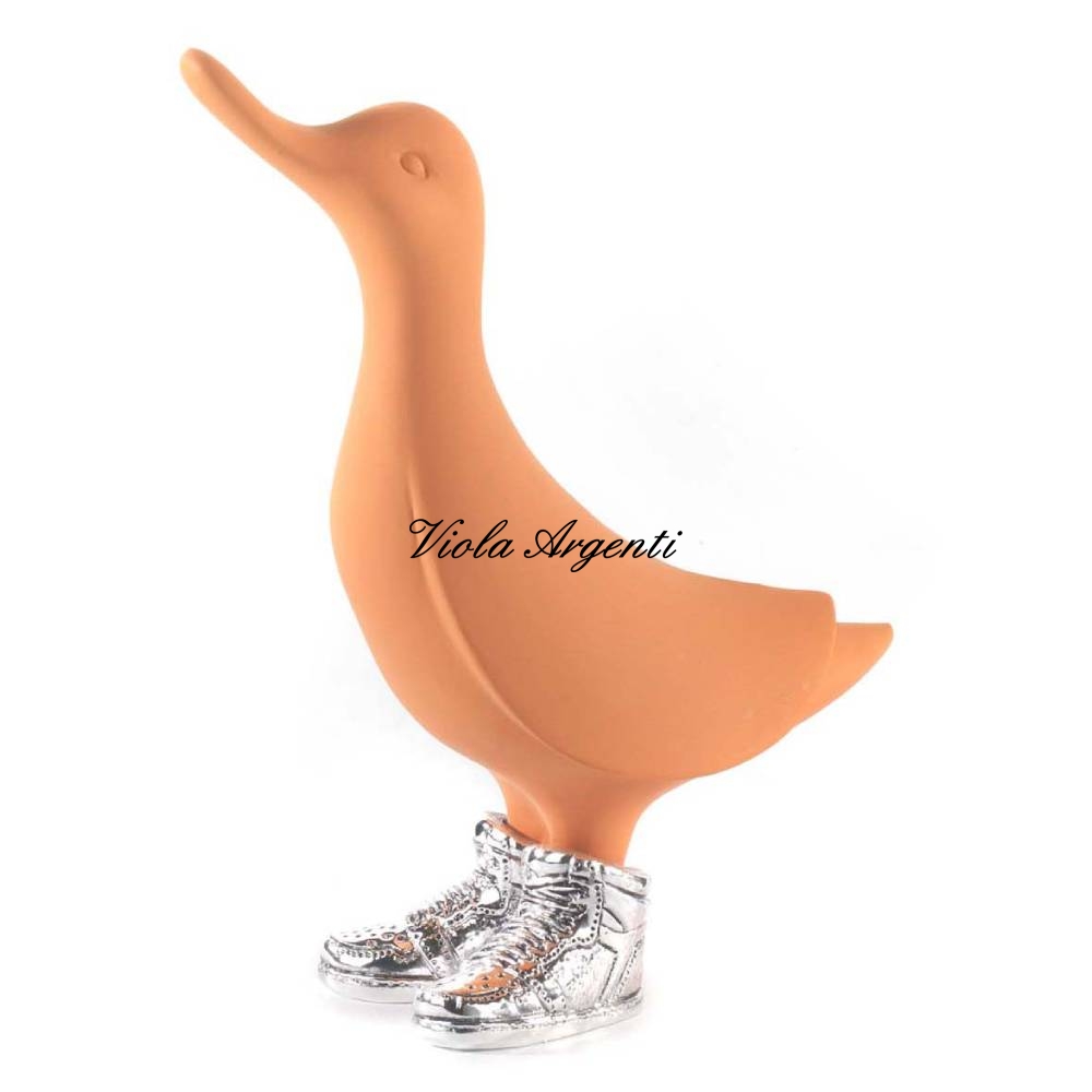 Scultura papera Air Jordan arancio di . Argento online