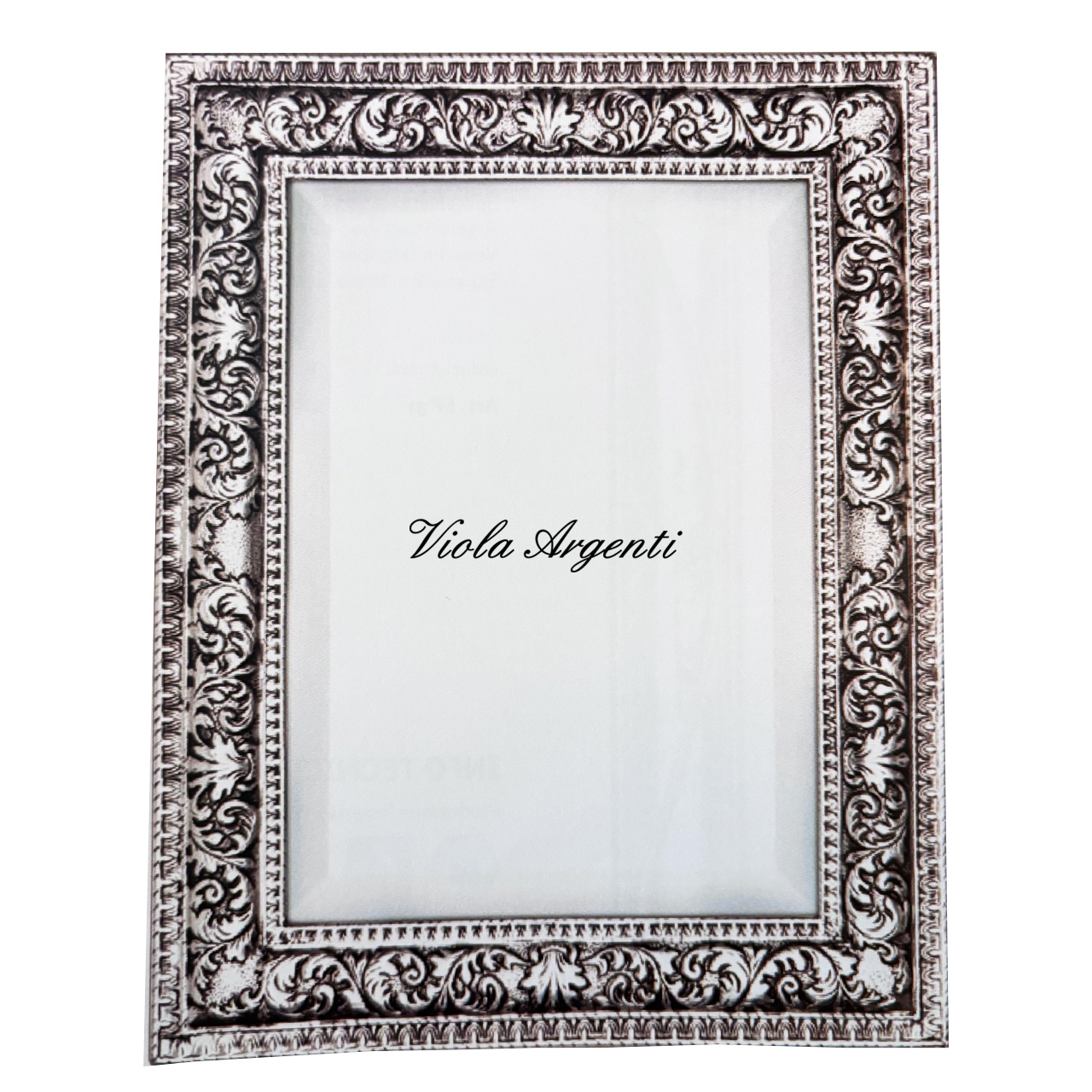 Wrought silver mirror